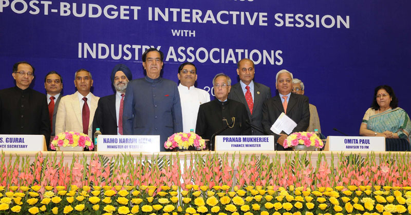 The Union Finance Minister, Shri Pranab Mukherjee along with the Minister of State for Finance..