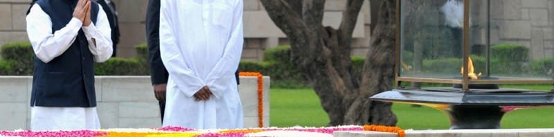 The Prime Minister, Dr. Manmohan Singh paying homage at the Samadhi of...