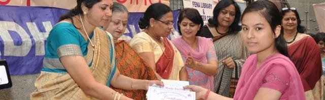 PNB Prerna distributes dictionary to the under priviledged childrens of Adharshila
