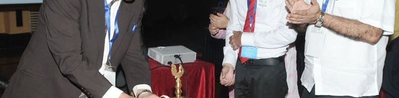 The Vice Chancellor, University of Kashmir, Prof Talat Ahmed lighting the lamp at...