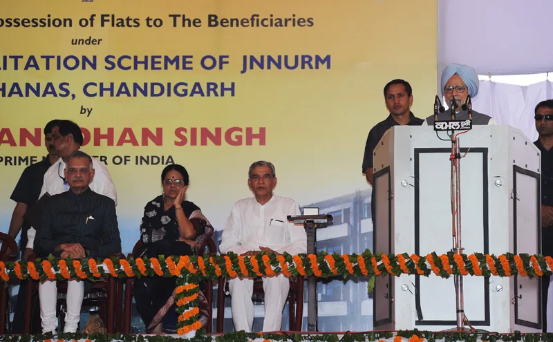 The Prime Minister, Dr. Manmohan Singh addressing at the handing over possession…