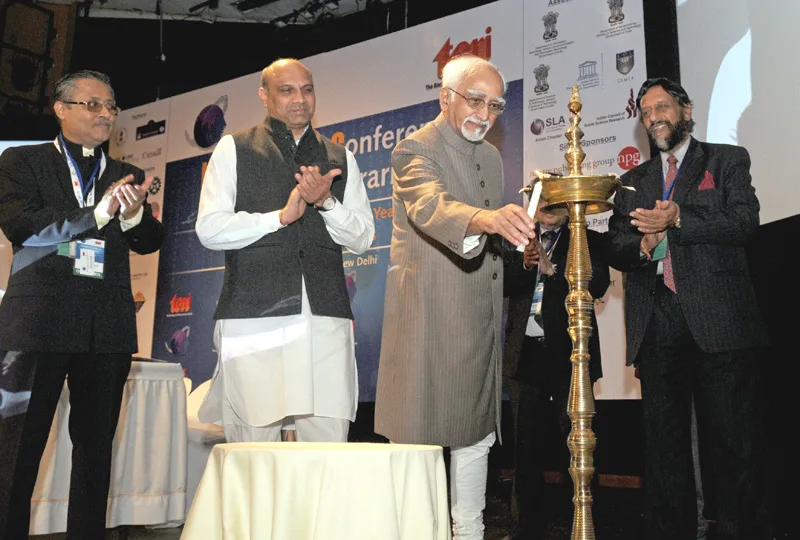 The Vice President, Shri Mohd. Hamid Ansari lighting the lamp to inaugurate the…