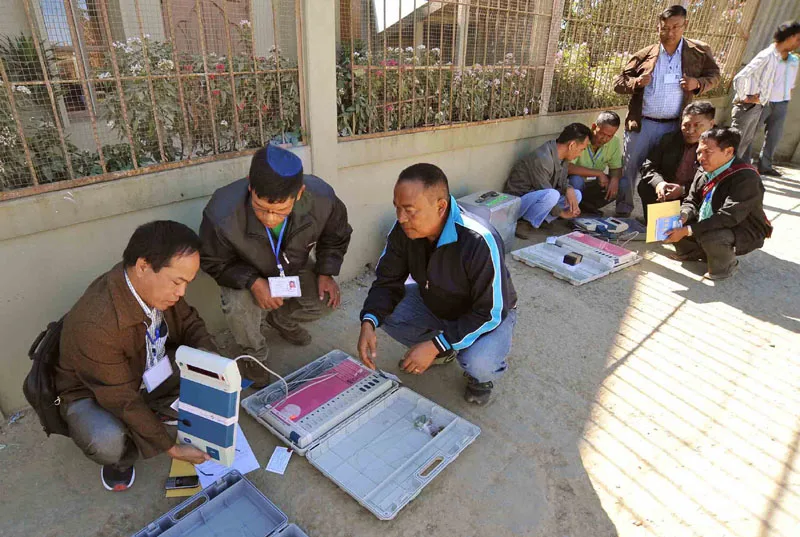 Polling officials checking the Electronic Voting Machines (EVM`s) and other necessary…