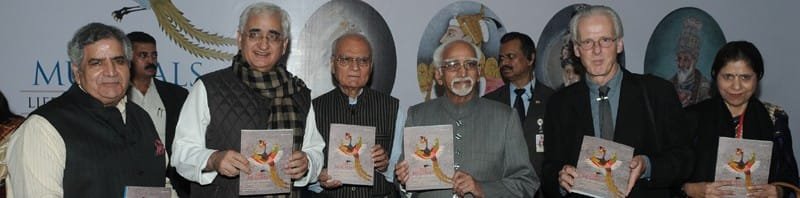 The Vice President, Shri Mohd. Hamid Ansari releasing a book on paintings...