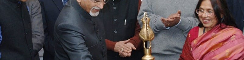 The Vice President, Shri Mohd. Hamid Ansari lighting the lamp to inaugurate...