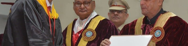 The President, Shri Pranab Mukherjee presenting the degree to a student, at...