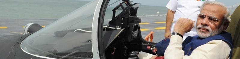 The Prime Minister, Shri Narendra Modi at an aircraft onboard INS Vikramaditya, in Goa