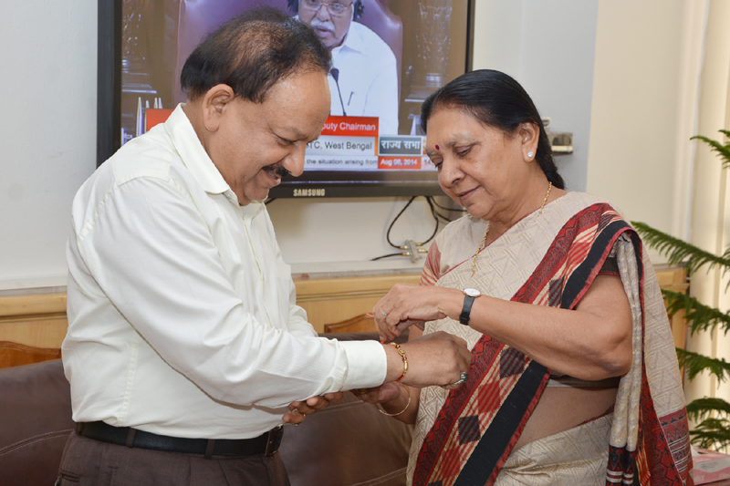 The Chief Minister of Gujarat, Smt. Anandiben Patel tying ‘Rakhi’ to ...