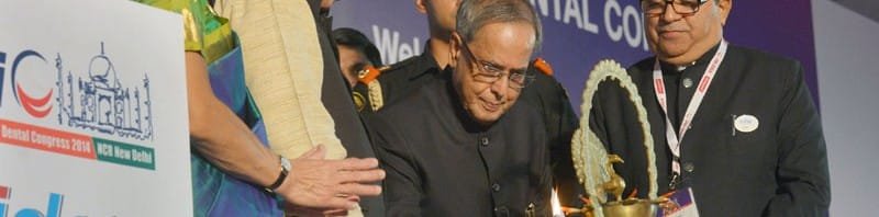 The President, Shri Pranab Mukherjee lighting the lamp to inaugurate the FDI ...