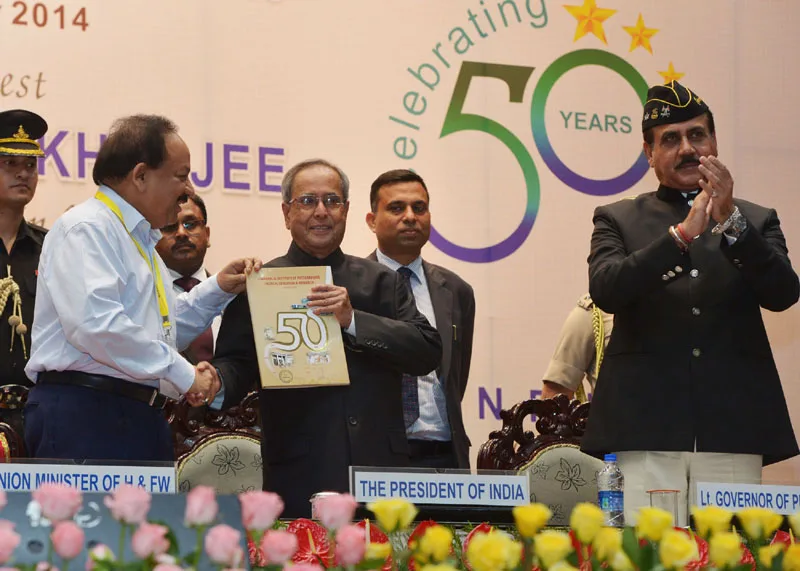 The President, Shri Pranab Mukherjee receiving the first copy of the Golden...
