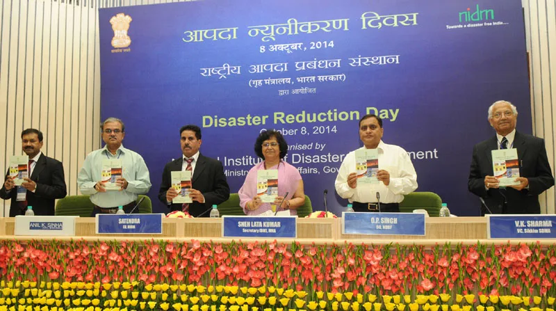 The Secretary, Border Management, Smt. Sneh Lata Kumar releasing the NIDM Publication, on the occasion of the Disaster Reduction Day, in New Delhi