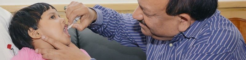 The Union Minister for Health and Family Welfare, Dr. Harsh Vardhan administering..