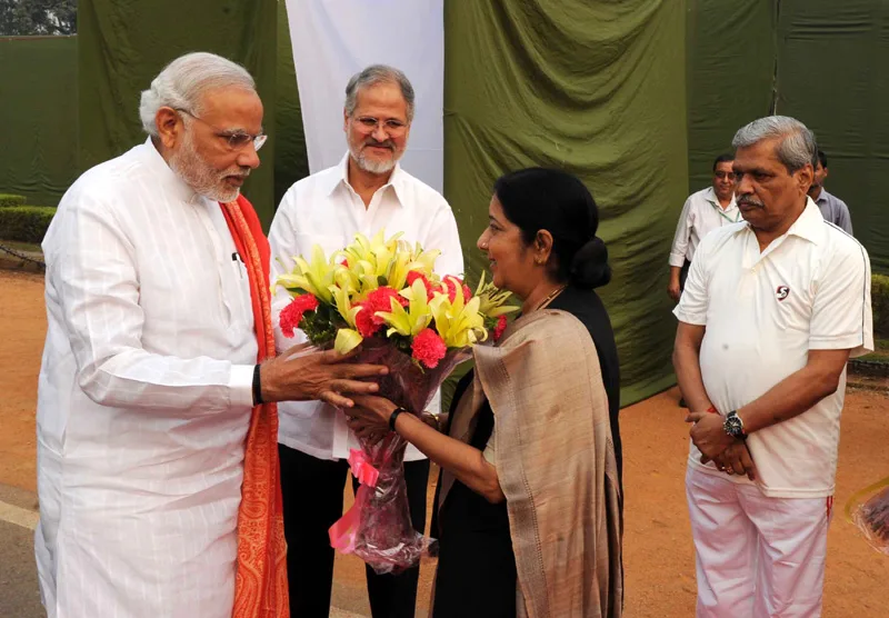 The Prime Minister, Shri Narendra Modi being received by the Union Minister for...