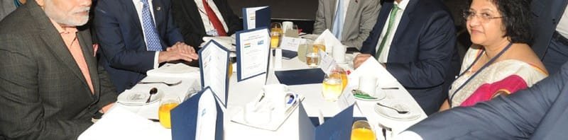 The Prime Minister, Shri Narendra Modi at the business breakfast hosted by the...