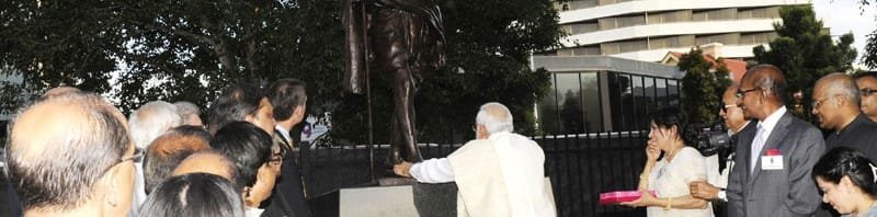 The Prime Minister, Shri Narendra Modi paying tributes to Mahatma Gandhi after...