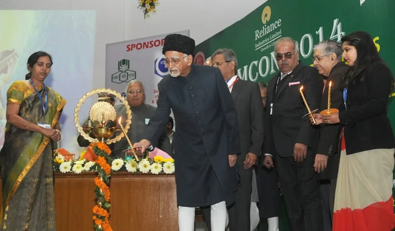 The Vice President, Shri Mohd. Hamid Ansari lighting the lamp to inaugurate the...