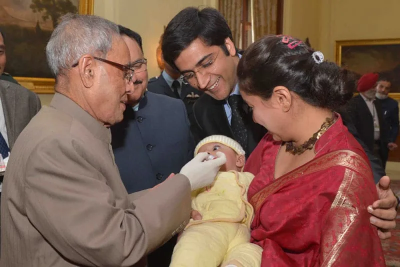 The President, Shri Pranab Mukherjee administering the Polio Drops to a child at..