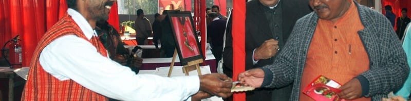 The Union Minister for Tribal Affairs, Shri Jual Oram visiting the stalls after inaugurating the..
