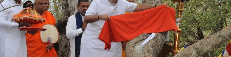 The Prime Minister, Shri Narendra Modi offer prayers, at the Sri Maha Bodhi Tree, in..