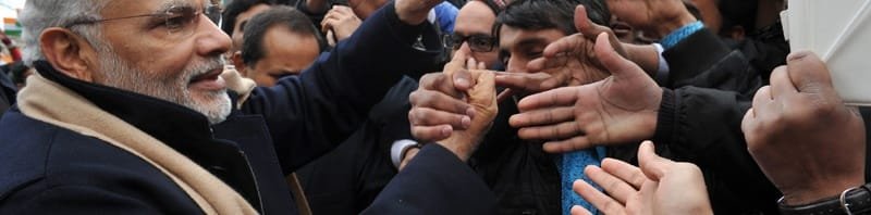 The Prime Minister, Shri Narendra Modi interacting with the people, on his arrival, at Berlin, in Germany