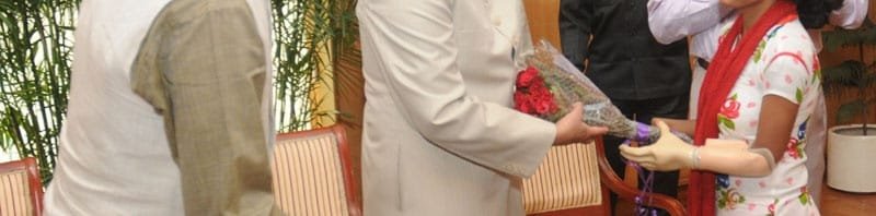 The Vice President, Shri Mohd. Hamid Ansari interacting a girl fitted ..