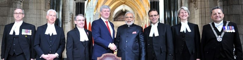 The Prime Minister, Shri Narendra Modi in group photo with the ..