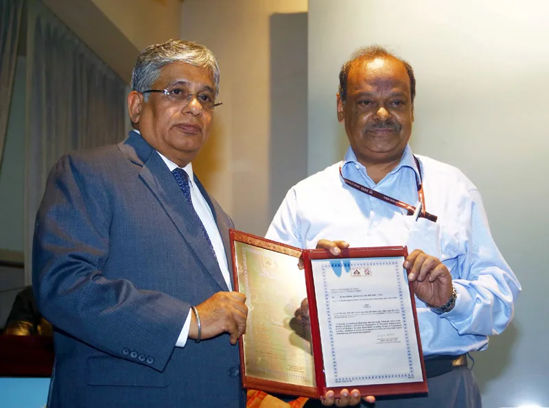 The Director General of BIS, Shri M.J. Joseph is presenting a ISO: 9001 certificate to..