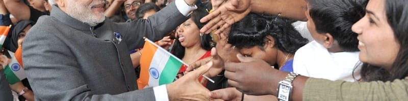 The Prime Minister, Shri Narendra Modi interacting with the people at the Indian ..