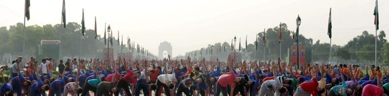 Participants of the 21st June International Yoga Day rehearsing at Rajpath, during..