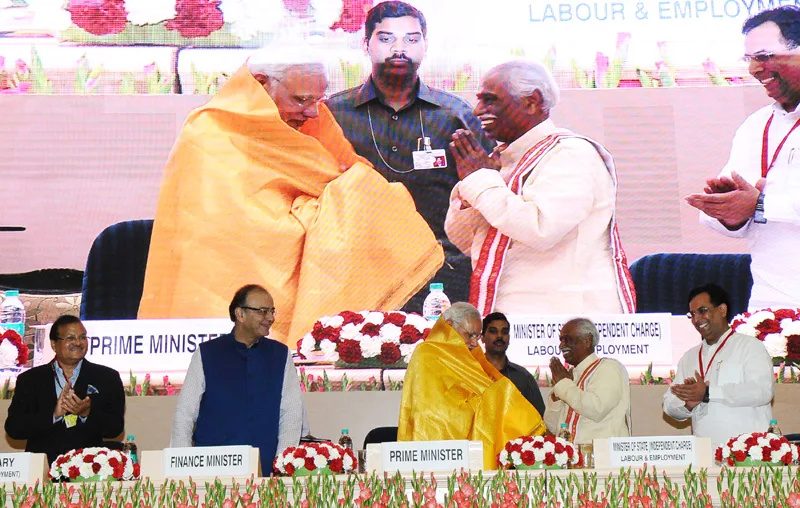 The Prime Minister, Shri Narendra Modi being welcomed by the Minister of State for Labour and …