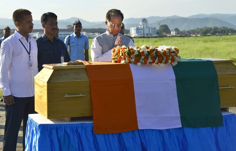 The Chief Minister of Assam, Shri Tarun Gogoi paying homage at the mortal remains of..
