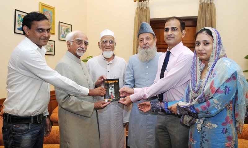 The Vice President, Shri Mohd. Hamid Ansari being presented a book entitled…