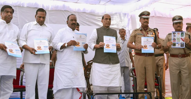 The Union Home Minister, Shri Rajnath Singh releasing the Silver Jubilee Souvenir of ..