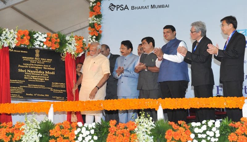 The Prime Minister, Shri Narendra Modi unveiling the plaque to lay the foundation stone of..