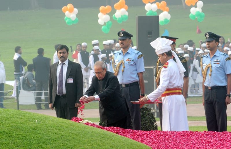 The President, Shri Pranab Mukherjee paying floral tributes at the Samadhi of the..