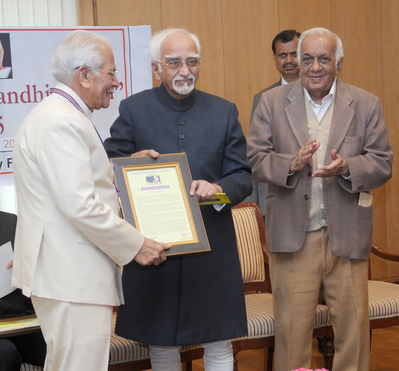 The Vice President, Shri M. Hamid Ansari giving away the International Gandhi Award for ..