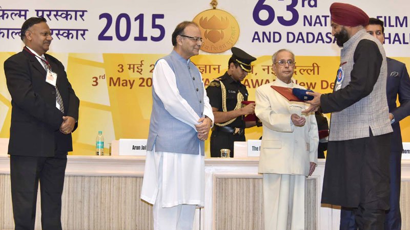 The President, Shri Pranab Mukherjee presenting the Nargis Dutt Award for the Best Feature Film on..