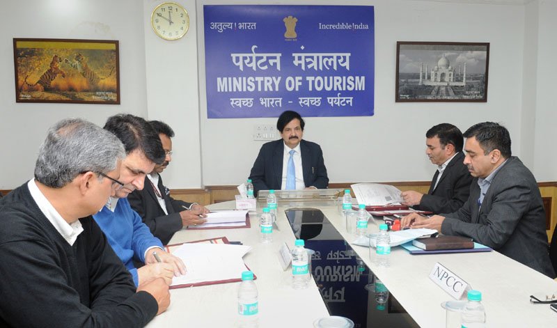 Vinod Zutshi witnessing the signing ceremony of a..