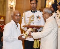The President, Shri Pranab Mukherjee presenting the Padma Shri Award..