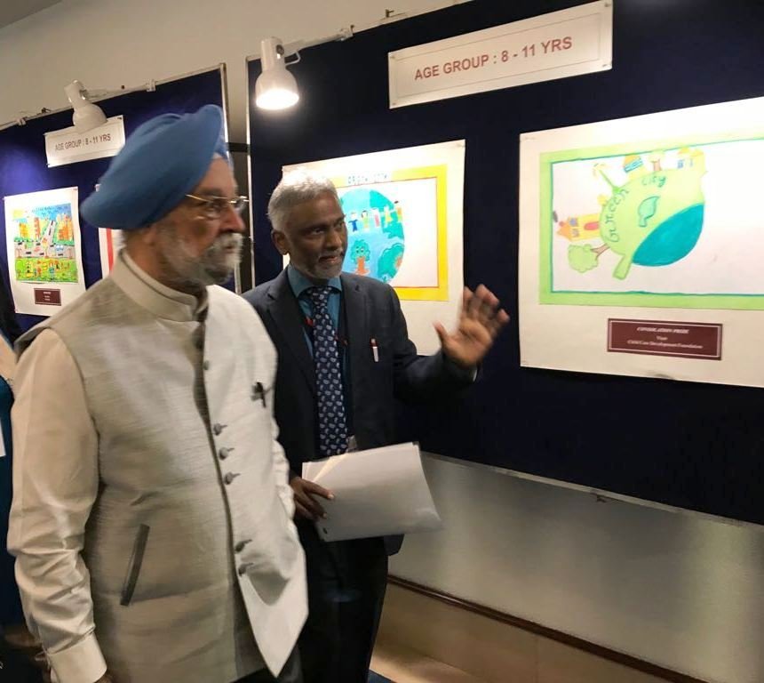 Hardeep S Puri inaugurates award winning paintings by underpriveleged childrens